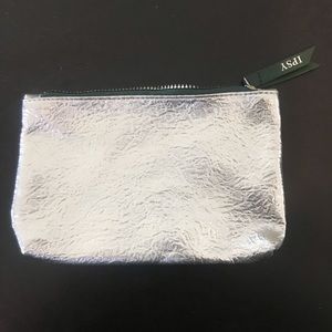 FREE Metallic silver makeup pouch
